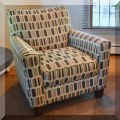F07. 2 Matching upholstered club chairs by Ashley Furniture. 35"h x 34"w x 35"d 
